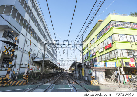 Cityscape: Railroad crossing in front of Shimo-Akatsuka Station, Itabashi-ku, Tokyo Cityscape: Railroad crossing in front of Shimo-Akatsuka Station, Itabashi-ku, Tokyo 70729449