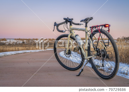 touring bicycle on a bike trail in late fall touring bicycle on a bike trail in late fall 70729886