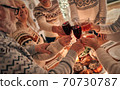 The happy family clink glasses above the christmas table 70730787
