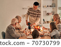 The family having a christmas dinner 70730799