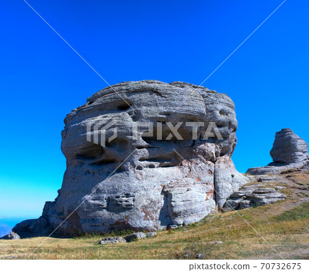 Million years damn pillars look at mountain valley. Million years damn pillars look at mountain valley. 70732675