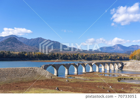 Taushubetsu River Bridge and Autumn Leaves 70733051