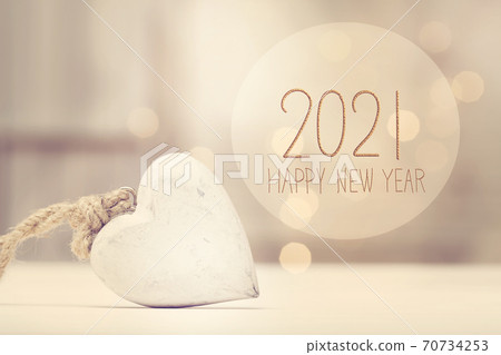 New Year 2021 message with a white heart New Year 2021 message with a white heart 70734253
