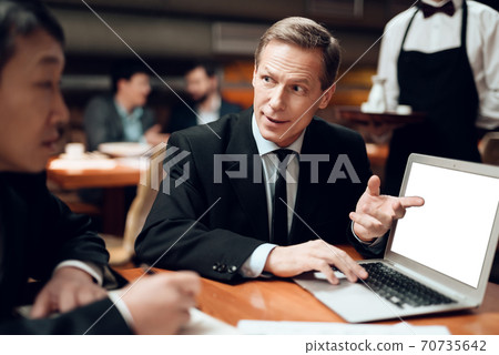 Man shows on a blank laptop screen for logo. Man shows on a blank laptop screen for logo. 70735642