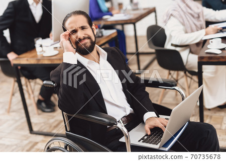 The man squints and feels severe pain. The man squints and feels severe pain. 70735678