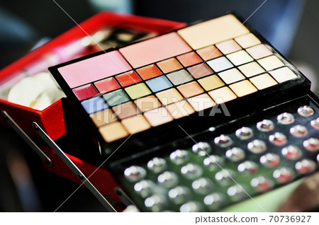 Cosmetics colorful eyeshadow pallette in selective focus 70736927