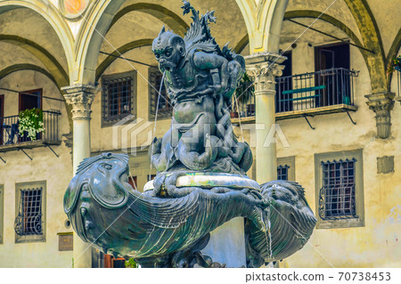 Fountain on the Piazza della Santissima Annunziata in the city of Florence, region of Tuscany, Italy. Sculptor Pietro Tacca Fountain on the Piazza della Santissima Annunziata in the city of Florence, region of Tuscany, Italy. Sculptor Pietro Tacca 70738453