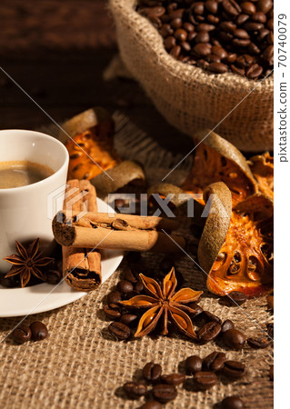 Close-up of coffee cup with cinnamon and star anise 70740079