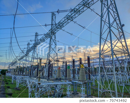 High voltage power transformer substation. Hight voltage tower with blue sky  70743492