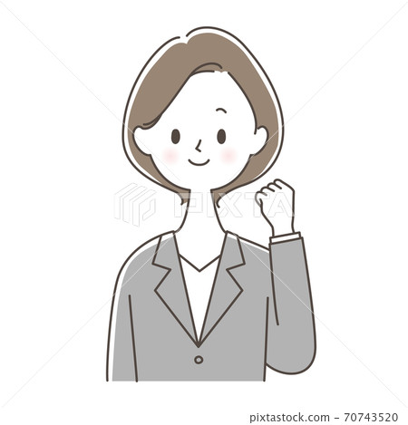 A woman in a suit with a guts pose 70743520