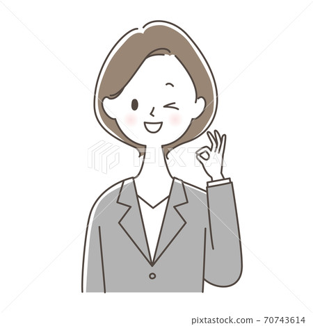 一個穿著西裝的女人,給一個好的跡象,眨眨眼 一個穿著西裝的女人,給一個好的跡象,眨眨眼 70743614