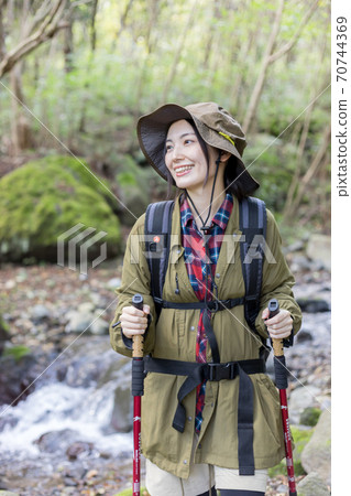 Woman trekking 70744369