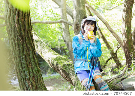 Woman trekking 70744507