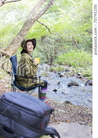 Woman trekking 70745200