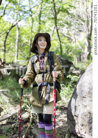 Woman trekking 70745201