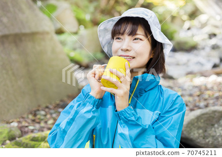 Woman trekking 70745211