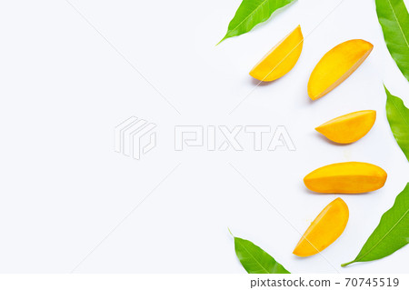 Tropical fruit, Mango  slices with leaves on white background. 70745519