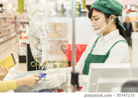 Accounting scene at a supermarket cash register Accounting scene at a supermarket cash register 70747173
