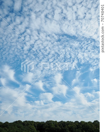 Blue sky, clouds and mountains Blue sky, clouds and mountains 70748401