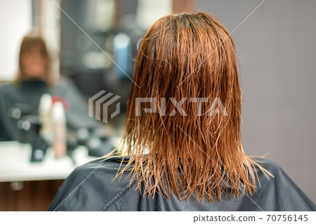 Back view of wet long red hair Back view of wet long red hair 70756145
