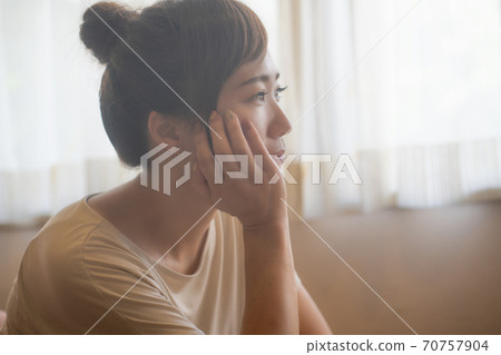 Thinking woman 70757904