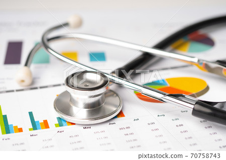 Stethoscope on chart graph paper, finance, account, statistic, analytic economy Business concept. Stethoscope on chart graph paper, finance, account, statistic, analytic economy Business concept. 70758743