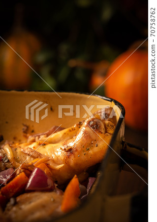 Baked chicken with vegetables Baked chicken with vegetables 70758762