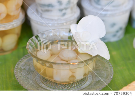 Lychee in syrup, Thai traditional dessert. Lychee in syrup, Thai traditional dessert. 70759304