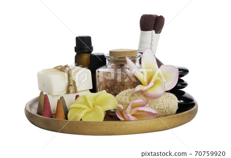 Spa products with organic soap luffa scrub compress ball,pink salt,black stones and beautiful flower on wooden tray isolated on white background with clipping path. Spa products with organic soap luffa scrub compress ball,pink salt,black stones and beautiful flower on wooden tray isolated on white background with clipping path. 70759920