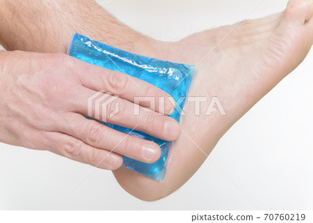 Cold gel compress on the ankle 70760219