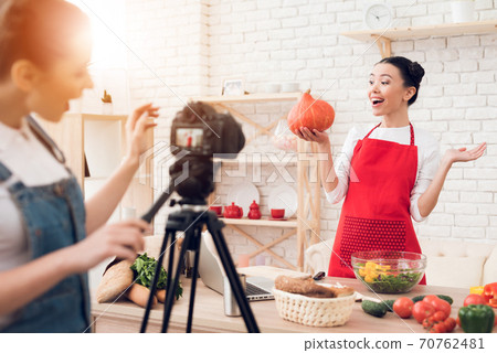 Happy culinary blogger hold up pumpkin. Happy culinary blogger hold up pumpkin. 70762481