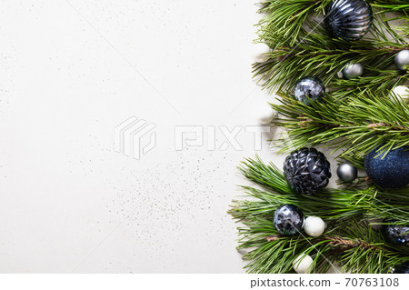 Christmas border with blue balls,fir tree branches Christmas border with blue balls,fir tree branches 70763108
