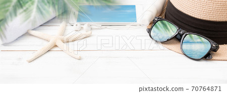 Summer background,straw hat,smart phone ,towel,ear phone and sunglasses with star fish on white wood table,clipping path on sun glasses  and mobile phone Summer background,straw hat,smart phone ,towel,ear phone and sunglasses with star fish on white wood table,clipping path on sun glasses  and mobile phone 70764871