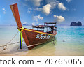 Longtail boat on beach in Thailand with blue sky 70765065