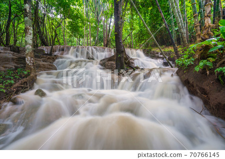 Waterfall scene at Pha Tad Waterfalls in rainforest at the Khuean Srinagarindra National Park Waterfall scene at Pha Tad Waterfalls in rainforest at the Khuean Srinagarindra National Park 70766145