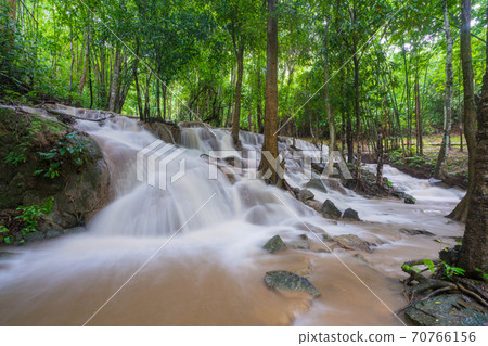 Waterfall scene at Pha Tad Waterfalls in rainforest  at the Khuean Srinagarindra National Park 70766156