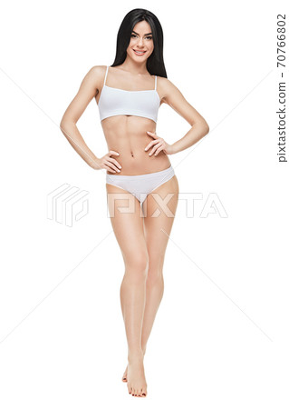 Fitness young woman with a beautiful body on white background 70766802
