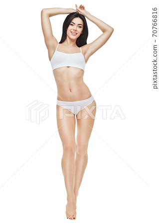Fitness young woman with a beautiful body on white background Fitness young woman with a beautiful body on white background 70766816
