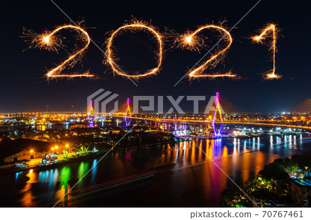 2021 happy new year fireworks over Bhumibol suspension bridge at night in Bangkok city, Thailand 2021 happy new year fireworks over Bhumibol suspension bridge at night in Bangkok city, Thailand 70767461