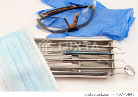 Group of tools, accessories for dental treatment. 70770645