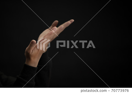 Woman's hand praying and worship to GOD Using hands to pray in religious beliefs and worship christian in the church or in general locations in vintage color tone or copy space. Woman's hand praying and worship to GOD Using hands to pray in religious beliefs and worship christian in the church or in general locations in vintage color tone or copy space. 70773976