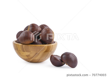 Fresh Chestnuts fruit isolated in wooden bowl on white background Fresh Chestnuts fruit isolated in wooden bowl on white background 70774003