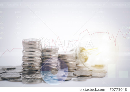 Coins stack and the light bulb with line graph business connect on white background, Saving ideas and investment budget, Business saving money concept, Copy space Coins stack and the light bulb with line graph business connect on white background, Saving ideas and investment budget, Business saving money concept, Copy space 70775048