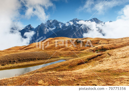 Sunset on mountain lake Koruldi. Upper Svaneti, Georgia, Europe. Caucasus mountains 70775356