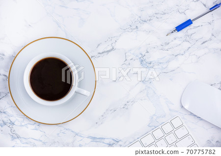 Black coffee on the desk with a computer, mouse Keyboard, book note, and pen Concept of working at home, personal business Black coffee on the desk with a computer, mouse Keyboard, book note, and pen Concept of working at home, personal business 70775782