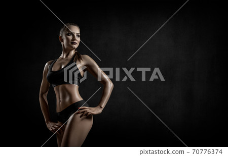 beautiful fitness woman on black background beautiful fitness woman on black background 70776374