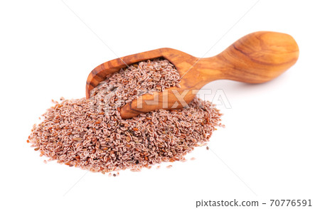 Plantago ovata seeds, isolated on white background. Plantain, indian flea or psyllium seeds in wooden scoop. Plantago ovata seeds, isolated on white background. Plantain, indian flea or psyllium seeds in wooden scoop. 70776591