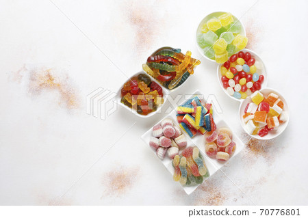 Colorful candies, jelly and marmalade,unhealthy sweets. 70776801