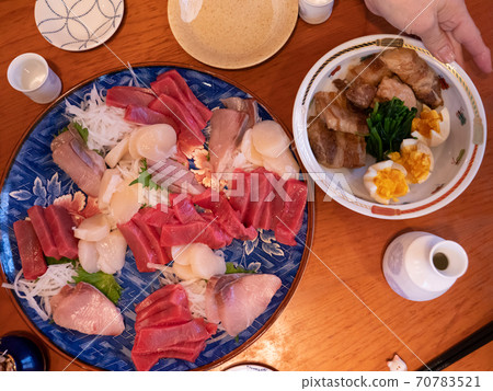 The table being set for a traditional new year's dinner in Japan The table being set for a traditional new year's dinner in Japan 70783521