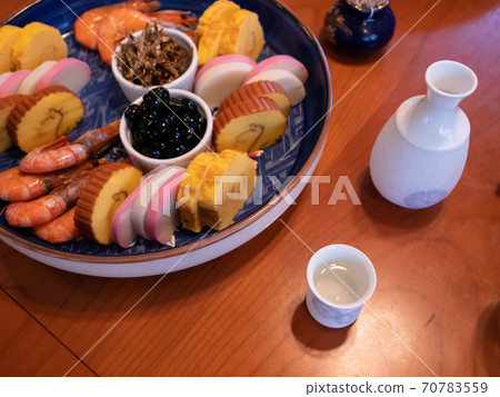 The table being set for a traditional new year's dinner in Japan The table being set for a traditional new year's dinner in Japan 70783559